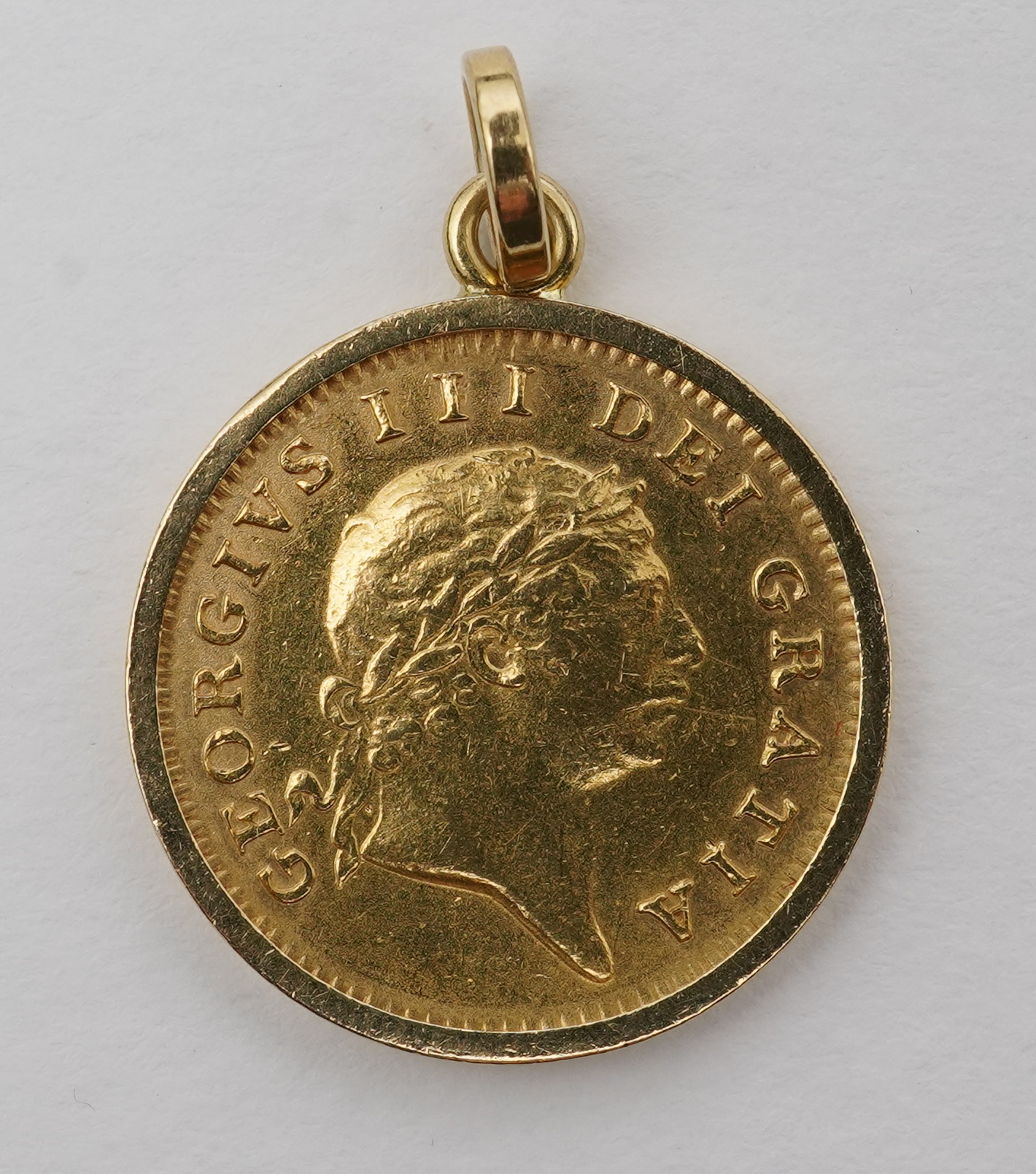 A George III half guinea pendant, circa 1804 and later
